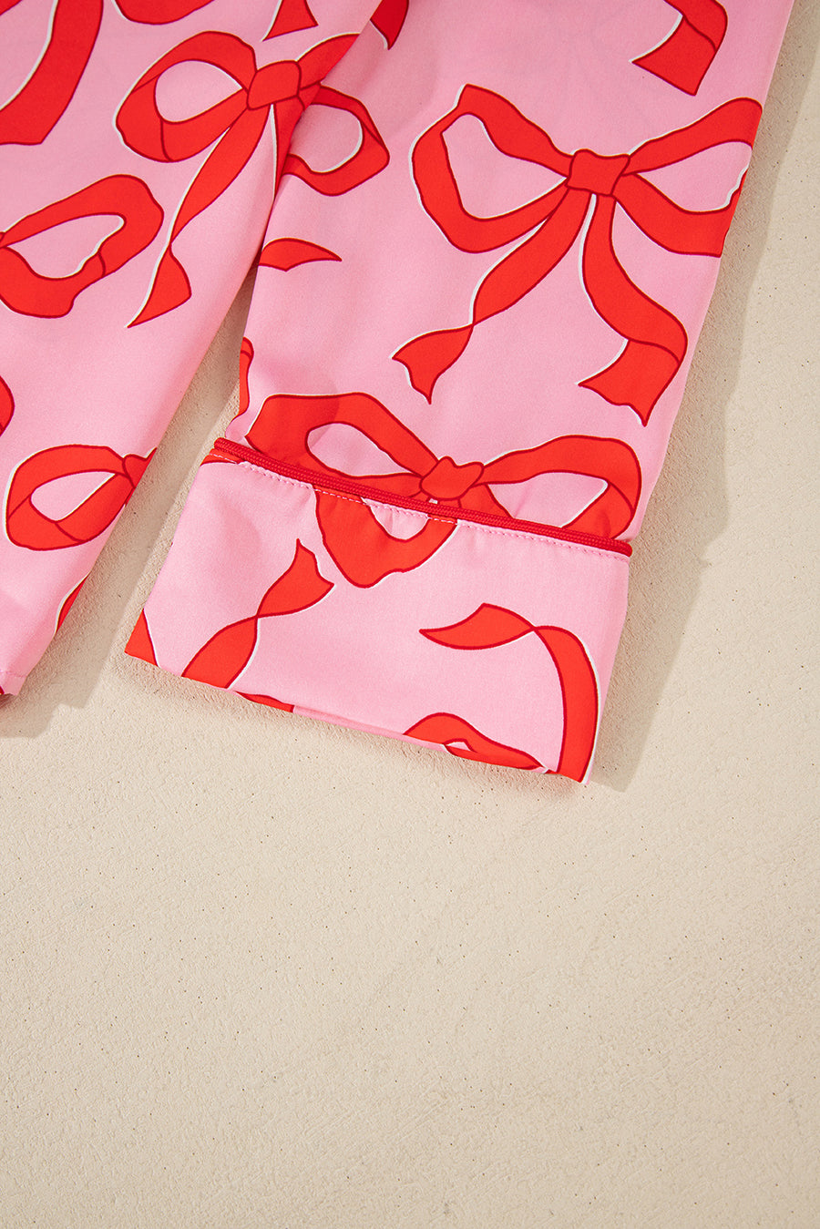 Pink All Over Bow Print Long Sleeve Button-Up Top and Pants Pajama Set