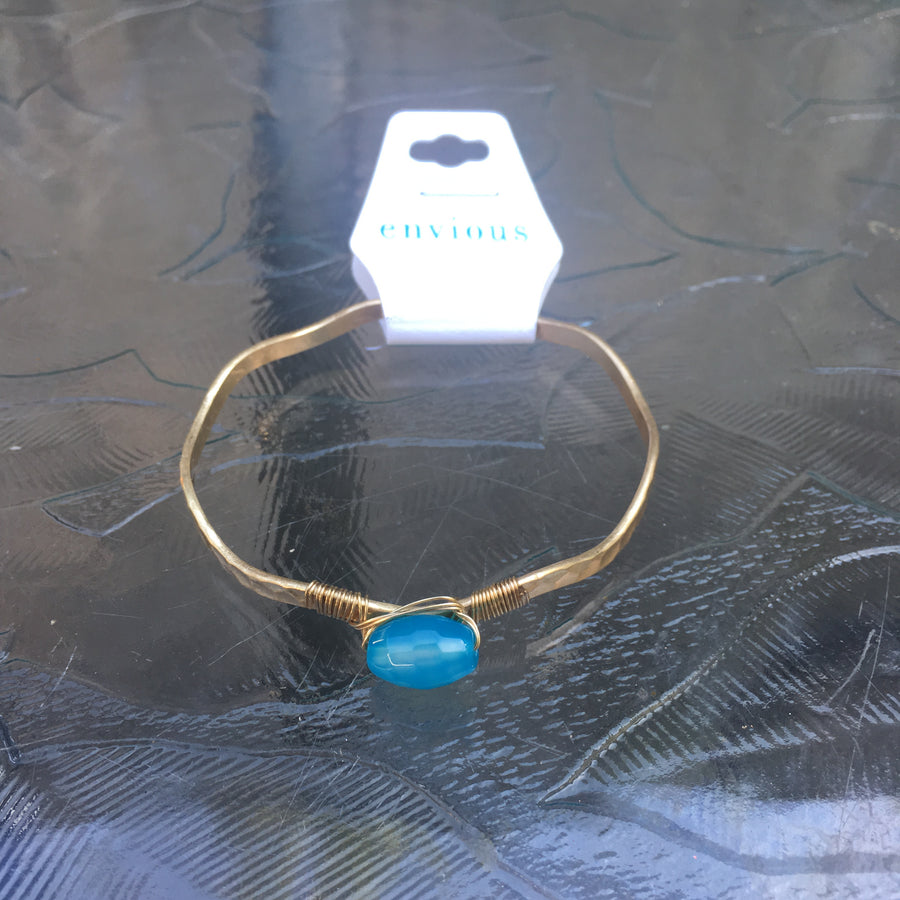 Worn Gold Tone Wavy Latch Bangle with Stone- Blue