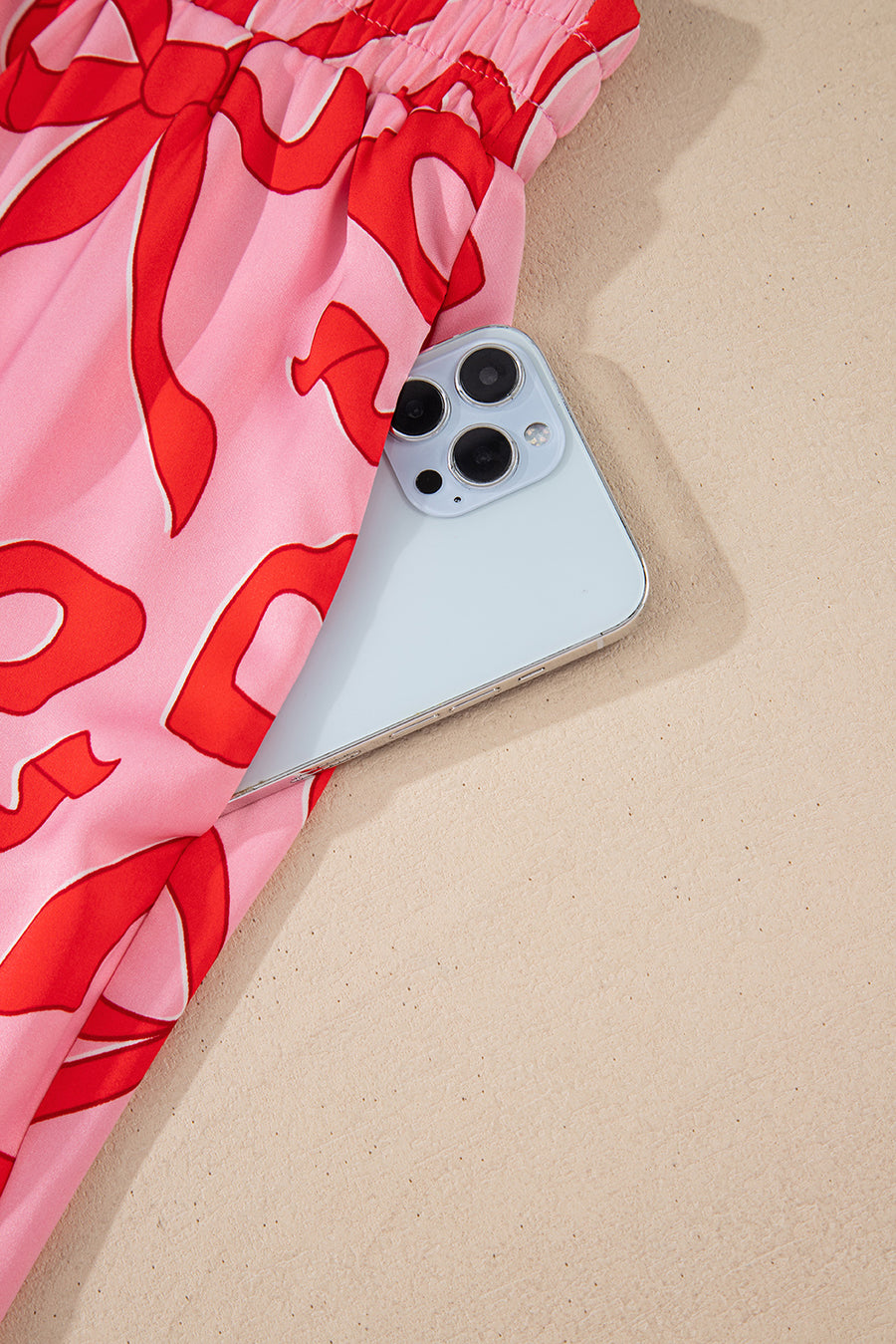 Pink All Over Bow Print Long Sleeve Button-Up Top and Pants Pajama Set