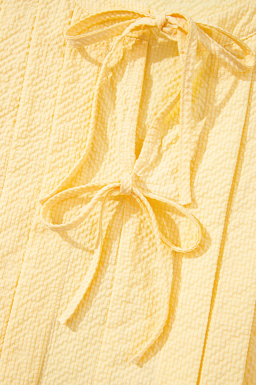 Butter Yellow Waffle Textured Tie Front Notched Neck Pleated Sleeveless Blouse