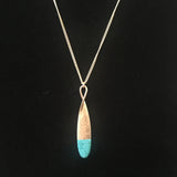 Burnished Gold Tone Necklace with Teardrop Rhinestone Pendant- Aqua