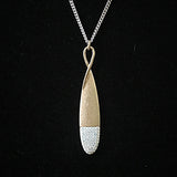 Burnished Gold Tone Necklace with Teardrop Rhinestone Pendant- White Opal