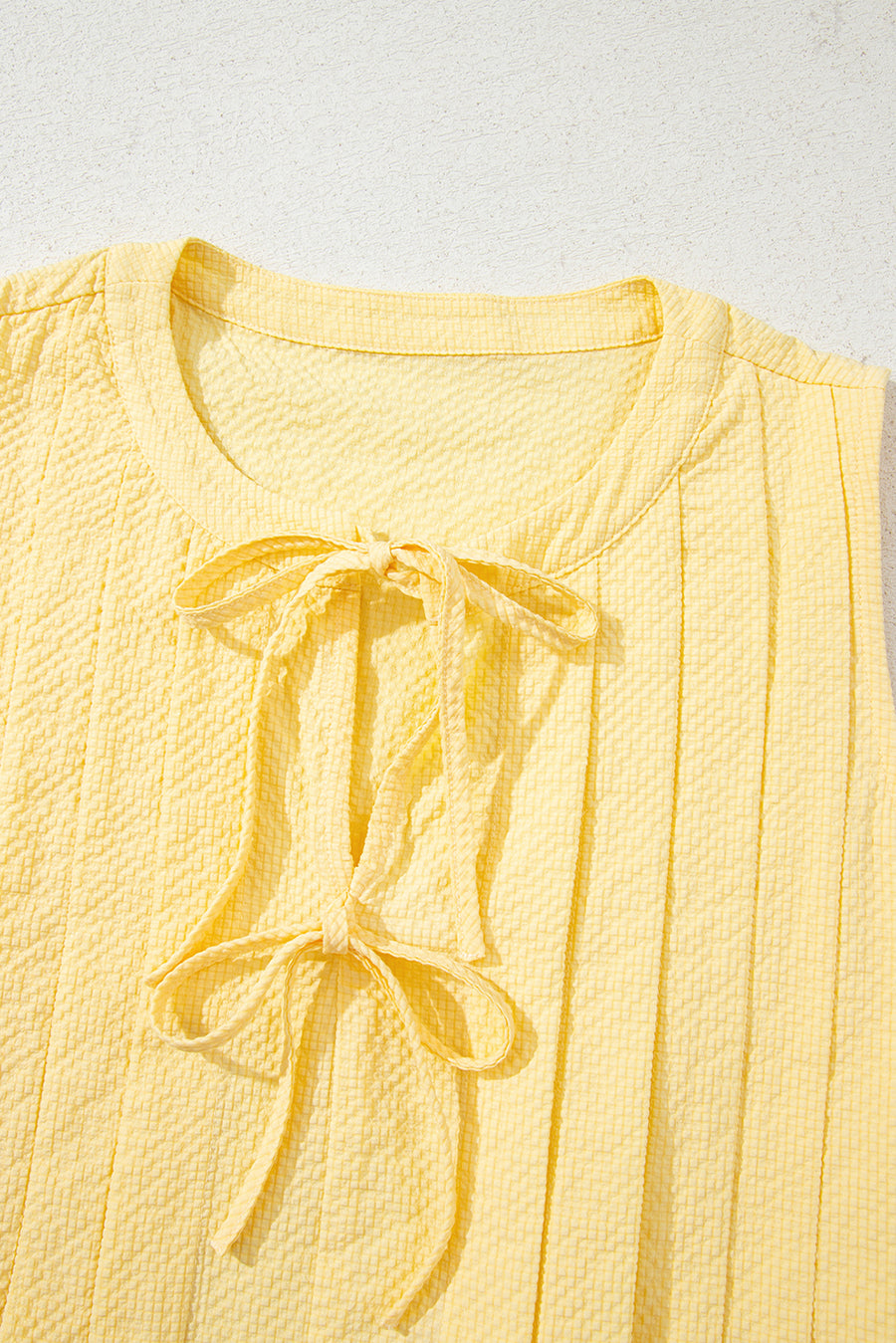 Butter Yellow Waffle Textured Tie Front Notched Neck Pleated Sleeveless Blouse