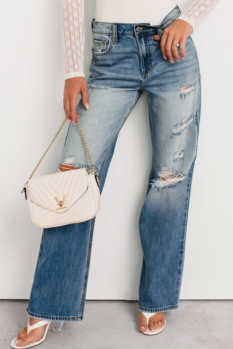 Medium Blue Mid-Rise Distressed Straight Leg Jeans