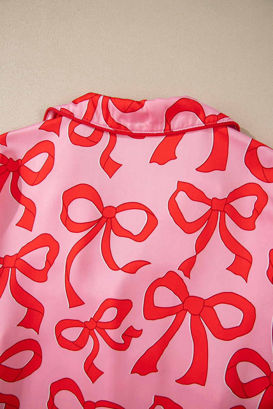 Pink All Over Bow Print Long Sleeve Button-Up Top and Pants Pajama Set