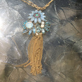 Burnished Gold Tone Rhinestone & Tassel Floral Pendant Necklace- Blue & White Opal