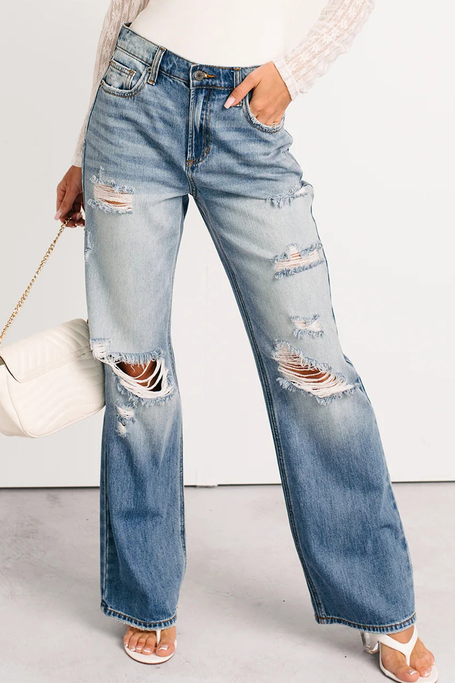 Medium Blue Mid-Rise Distressed Straight Leg Jeans