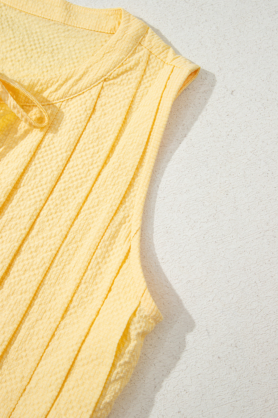 Butter Yellow Waffle Textured Tie Front Notched Neck Pleated Sleeveless Blouse
