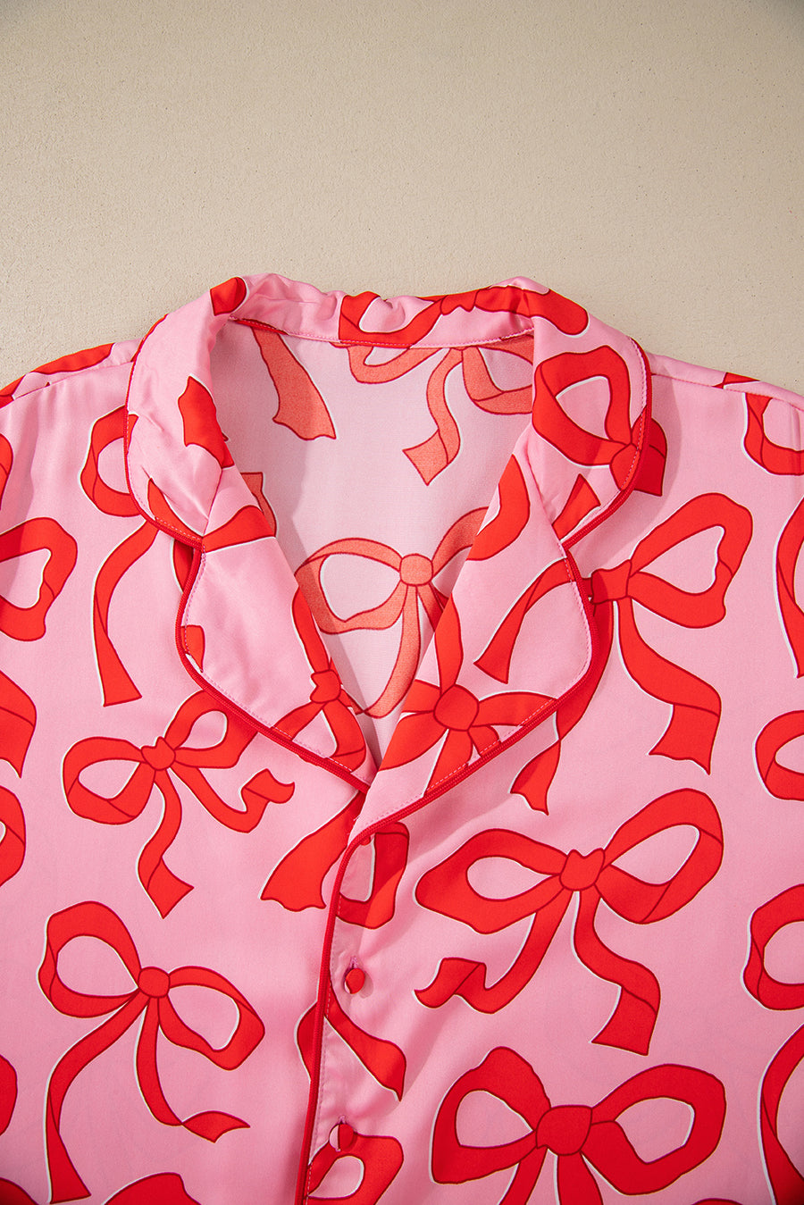 Pink All Over Bow Print Long Sleeve Button-Up Top and Pants Pajama Set