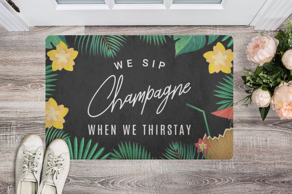 We Sip Champagne Welcome Mat-Tropical/Black