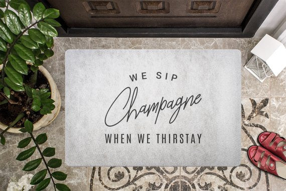 We Sip Champagne Welcome Mat-Stone/Black